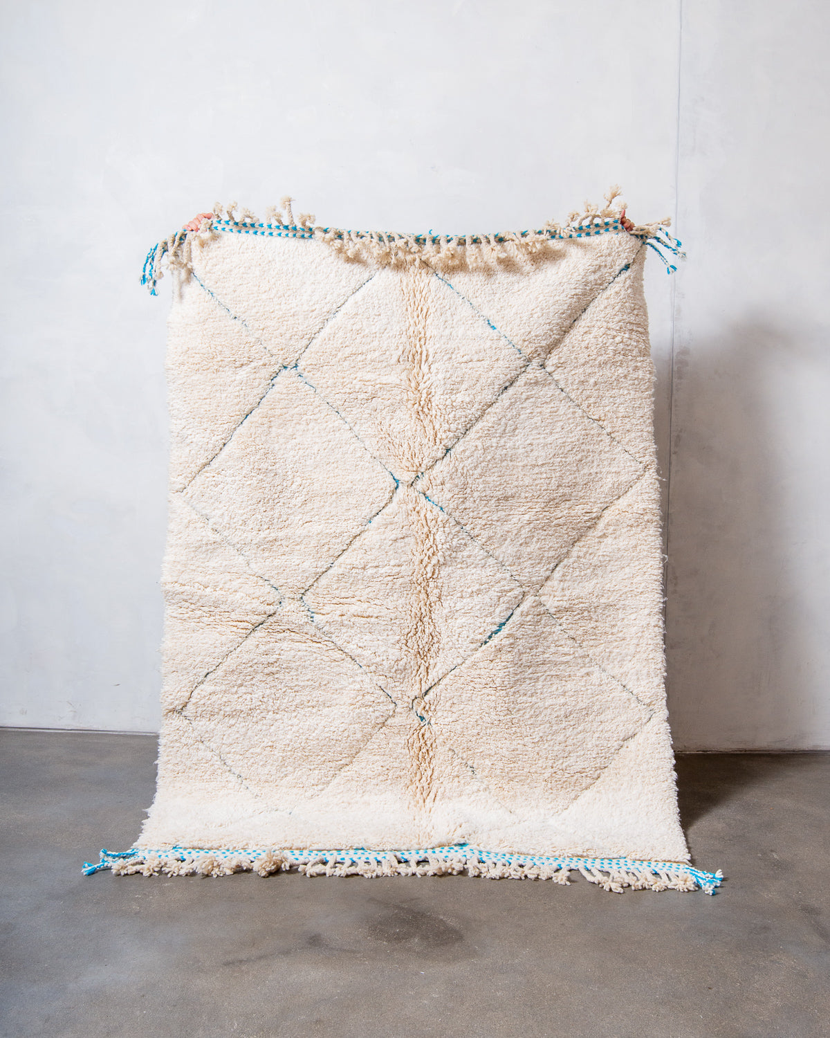 Modern, designer, handcrafted Berber rug from Morocco. Beniourain carpet with beautiful colours and patterns and fluffy wool texture.